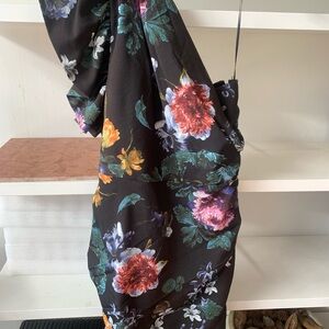 H&M Floral Black One Shoulder Mini Dress with ruffle sleeve and ruched skirt.